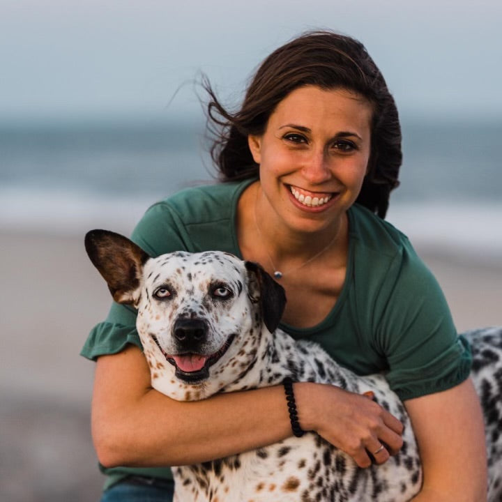 Samantha Clearfield the owner of Doggie Beach Boutique and her dog Nova